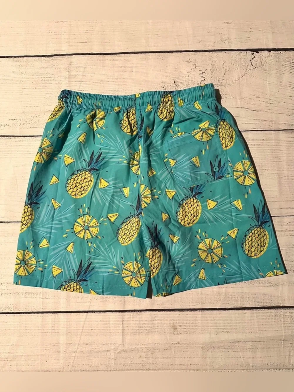 Kids Teal Pineapple Swim Trunks with Yellow Drawstring